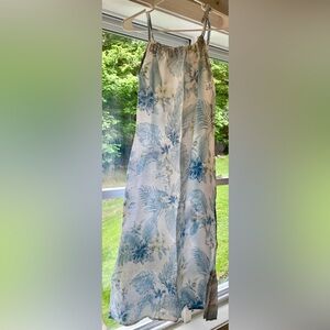 Bellambra Italian linen dress with soft blue and yellow hibiscus floral print.